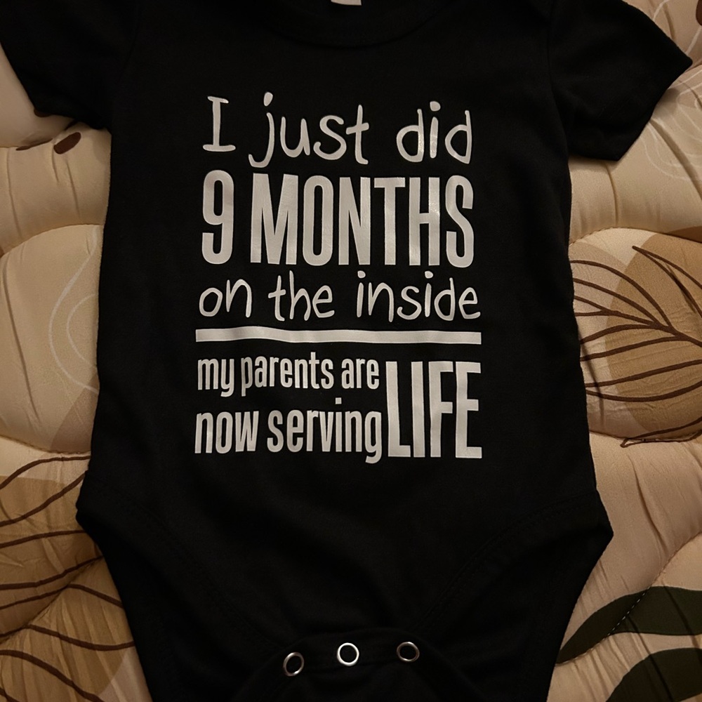 Playful Black Baby Bodysuit with Fun Text